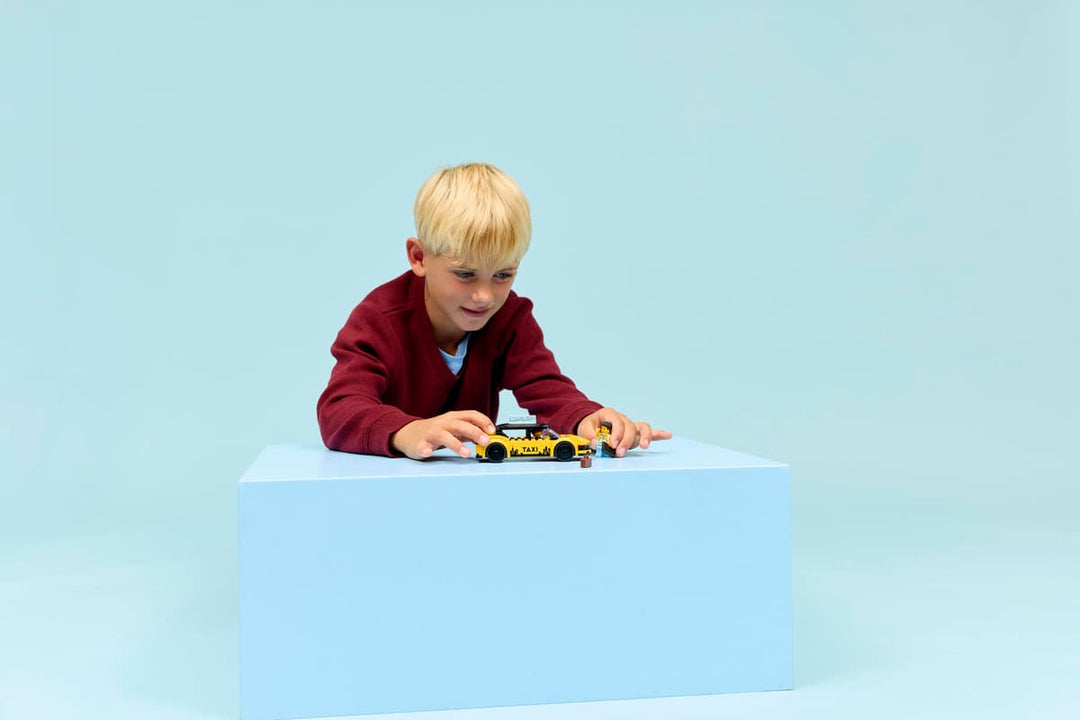 Juego De Construcción Taxi Amarillo 122 Piezas Lego Original