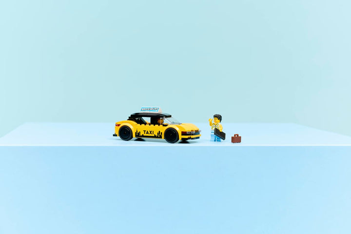 Juego De Construcción Taxi Amarillo 122 Piezas Lego Original