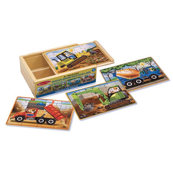 Caja con 4 Rompecabezas de Vehículos de Construcción
